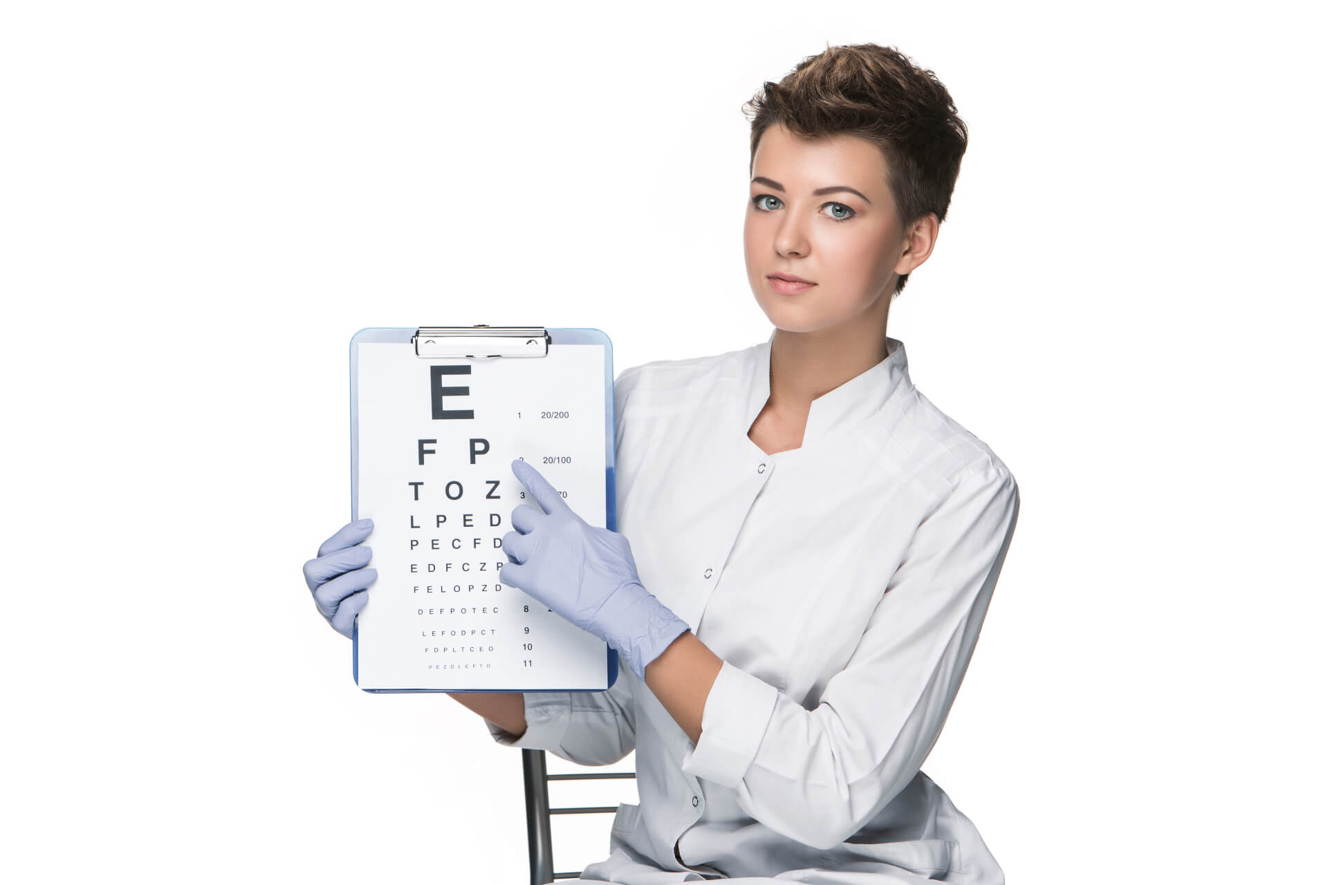 young-woman-ophthalmologist-with-eye-chart (1) (1)